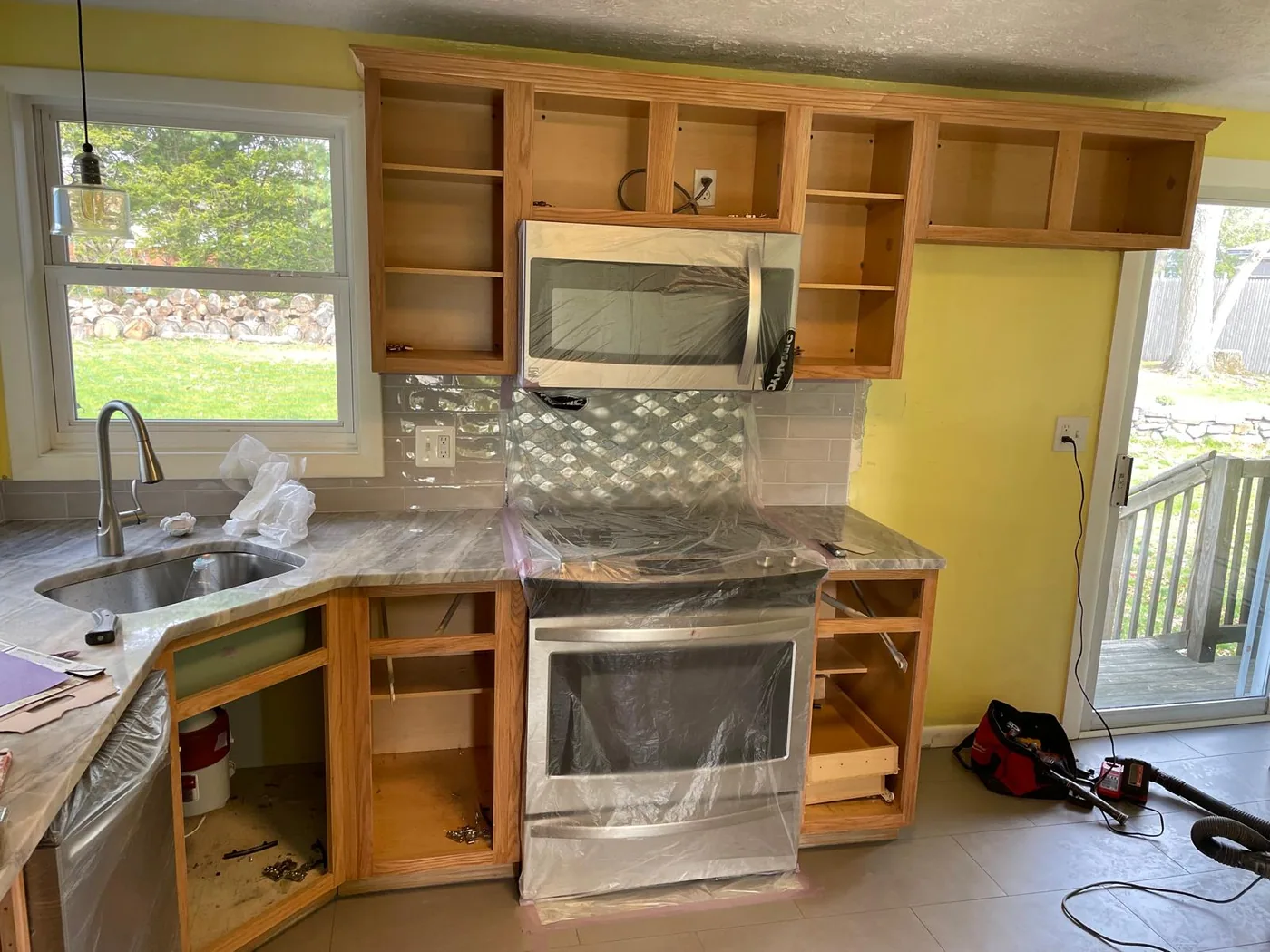 Kitchen cabinet refinishing — before